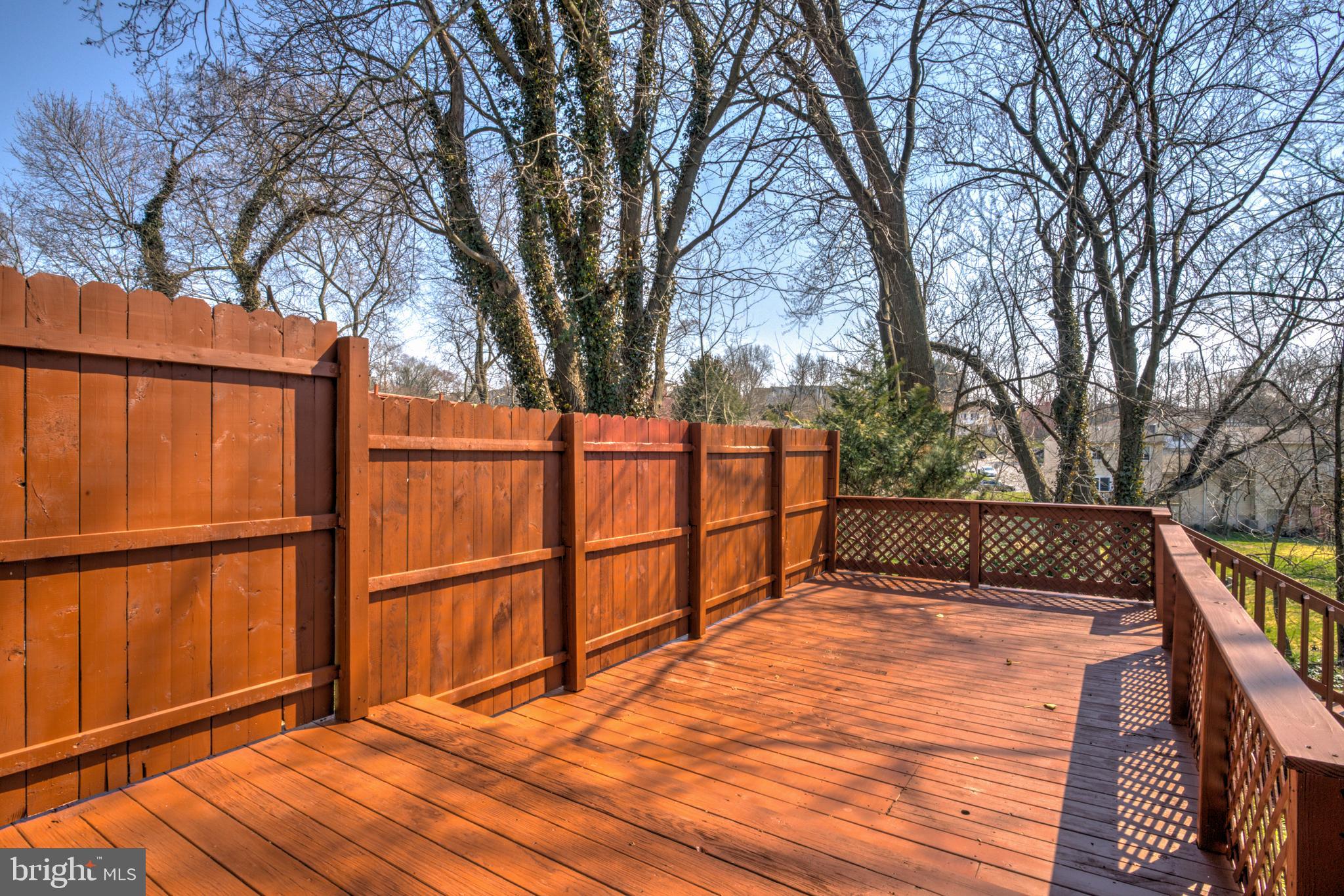 254 Blue Rock Road Millersville, PA 17551 - Photo 39 of 40 a view of backyard with wooden fence and large trees