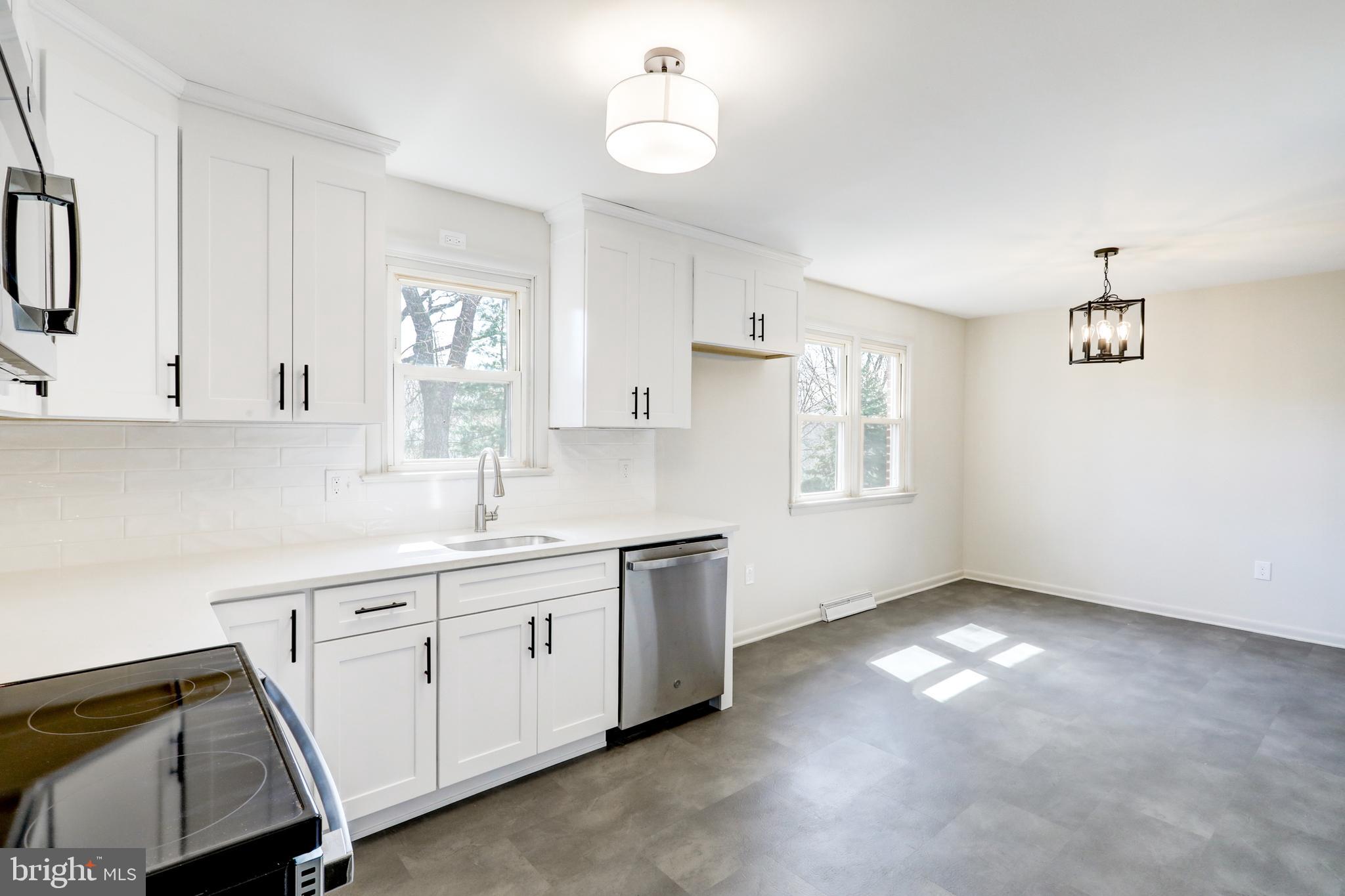 254 Blue Rock Road Millersville, PA 17551 - Photo 7 of 40 a kitchen with a sink cabinets and window