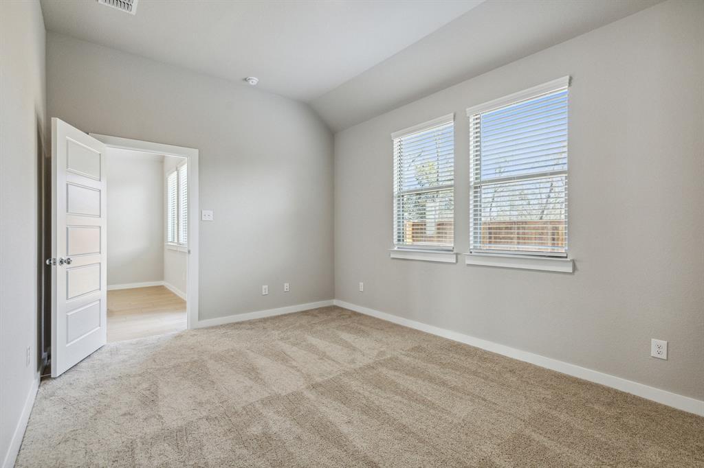 112 Millwood Road Lavon, TX 75166 - Photo 13 of 24 a view of an empty room with a window