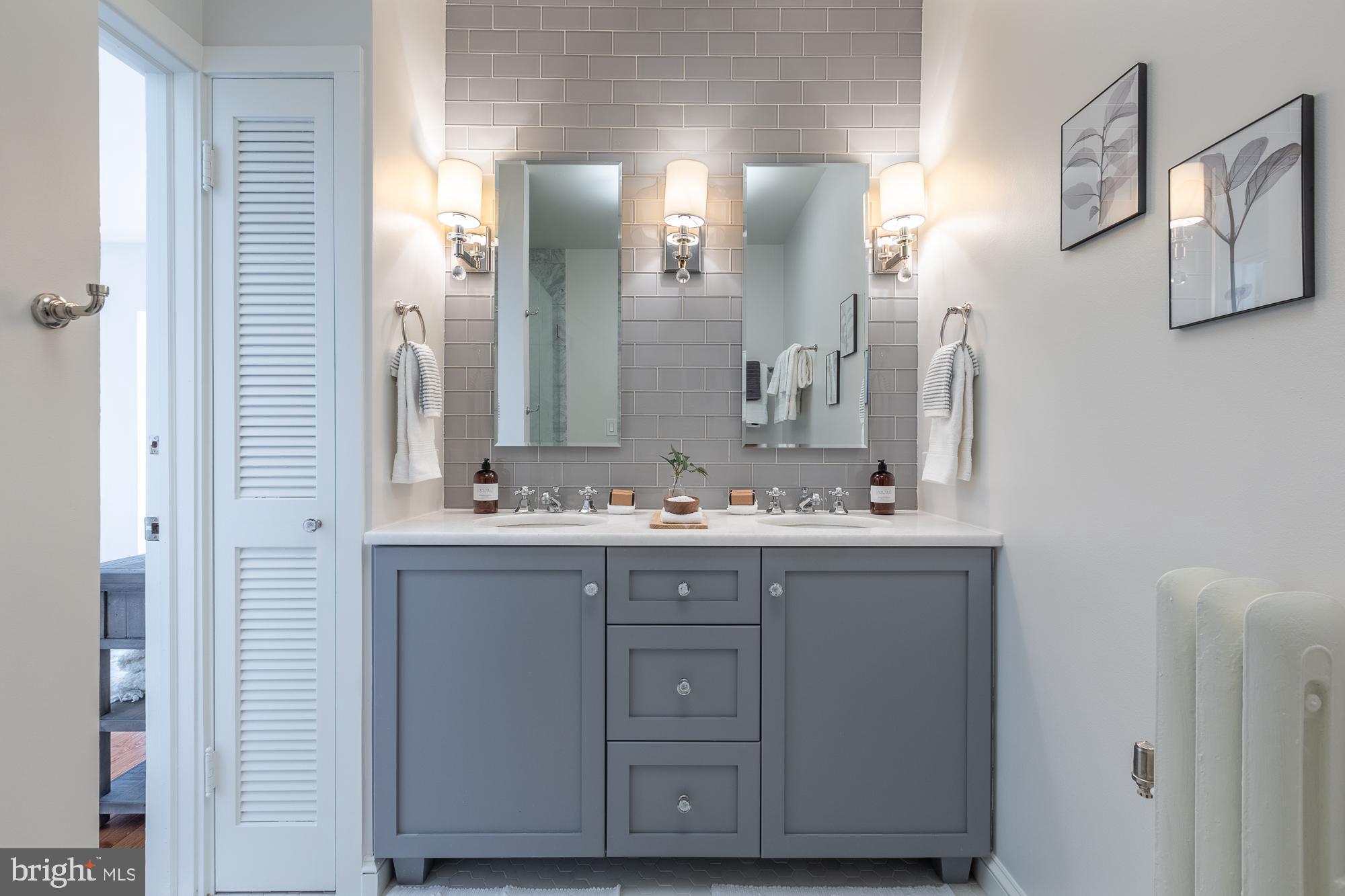 2004 Klingle Road Northwest Washington, DC 20010 - Photo 39 of 70 Double vanity in en-suite primary bathroom