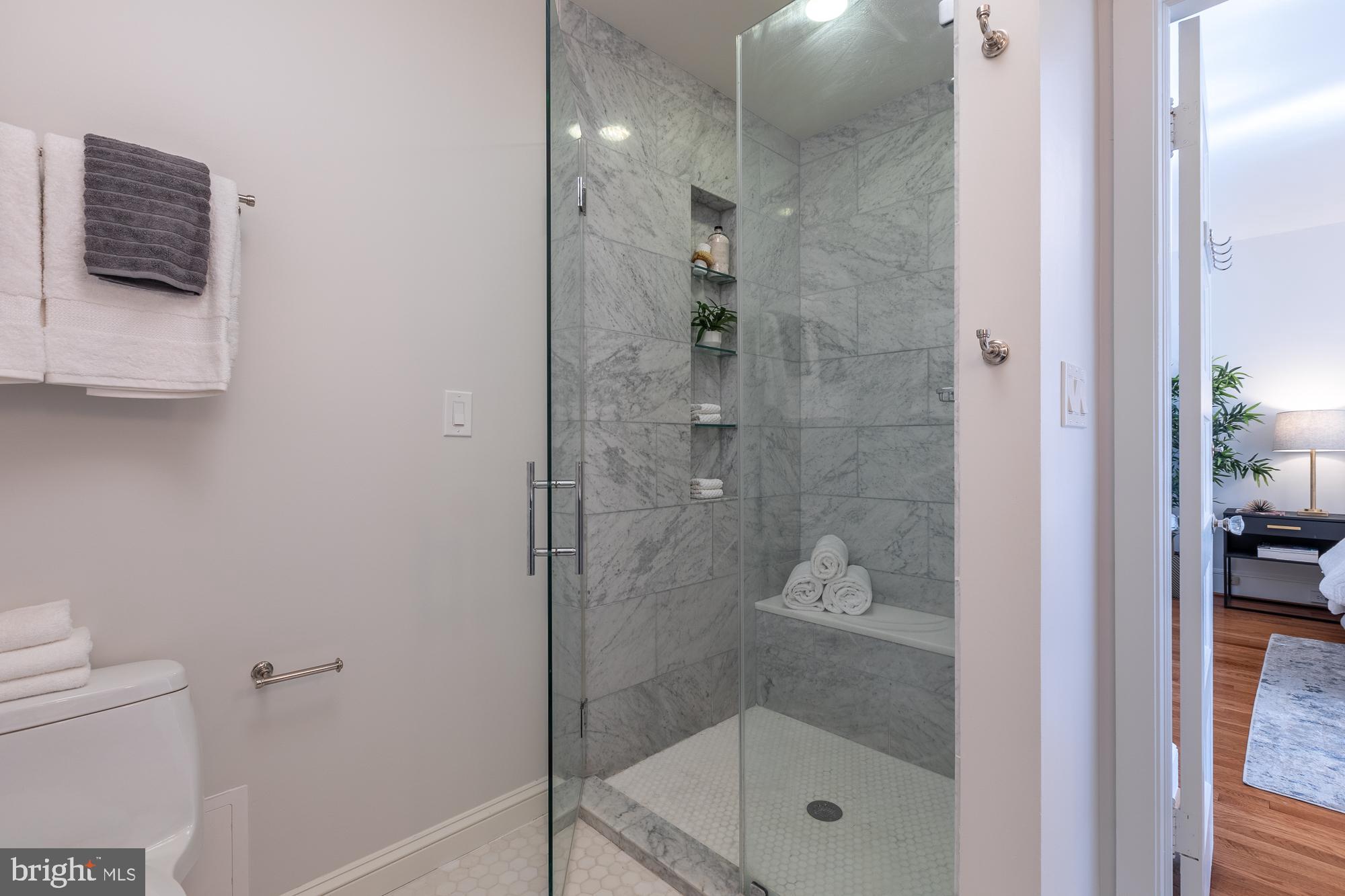 2004 Klingle Road Northwest Washington, DC 20010 - Photo 41 of 70 Marble walk-in shower