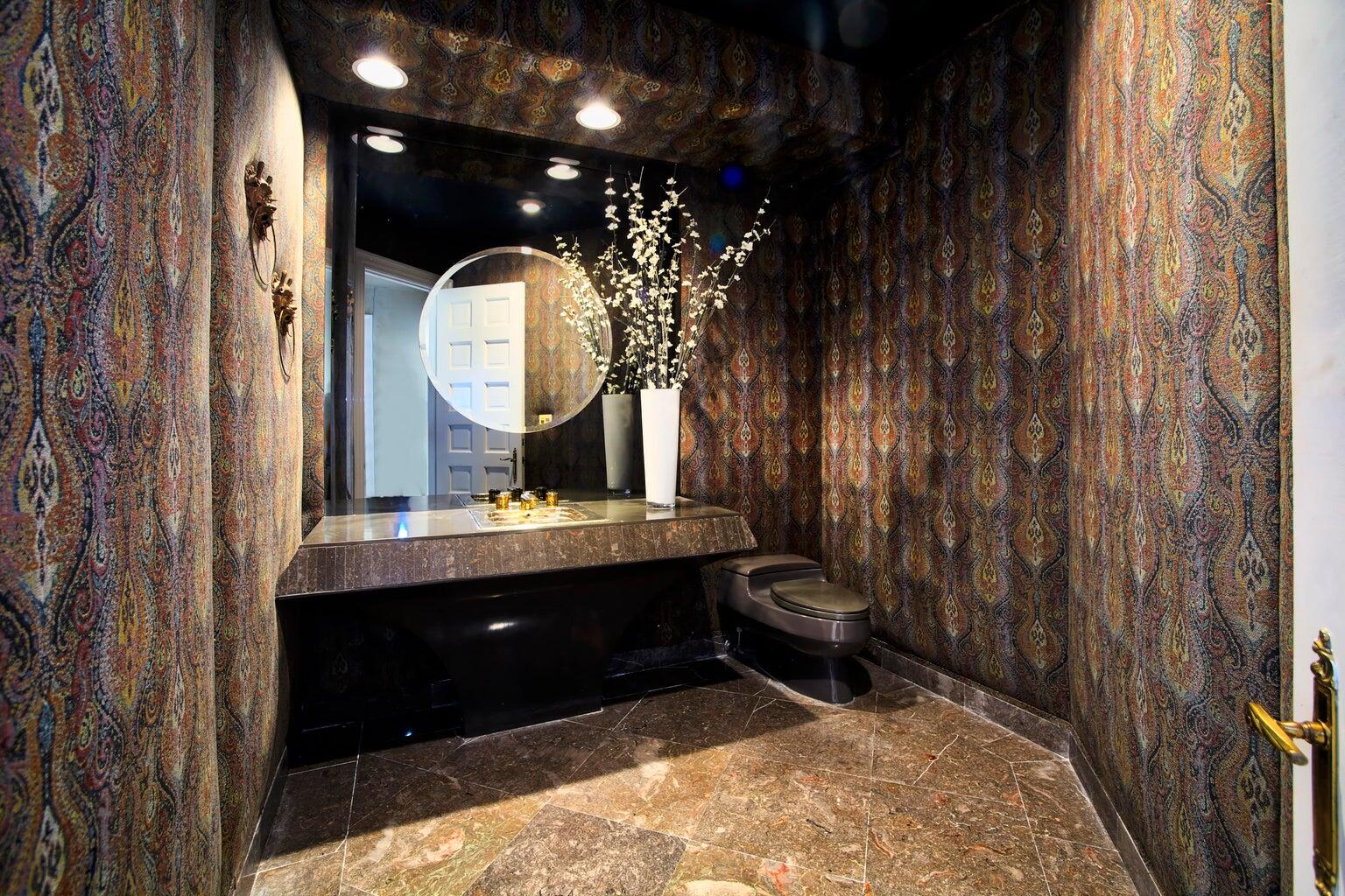 21125 Hamlin Drive Boca Raton, FL 33433 - Photo 20 of 69 a bathroom with a sink and a mirror