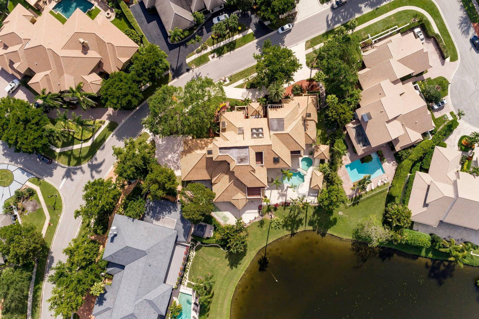 21125 Hamlin Drive Boca Raton, FL 33433 - Photo 47 of 69 an aerial view of a house with a yard and garden