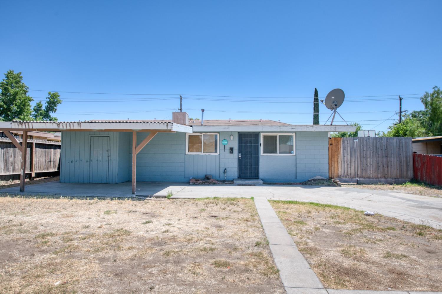 2326 East Hampton Way Fresno, CA 93726 - Photo 22 of 22 a house view with a backyard space
