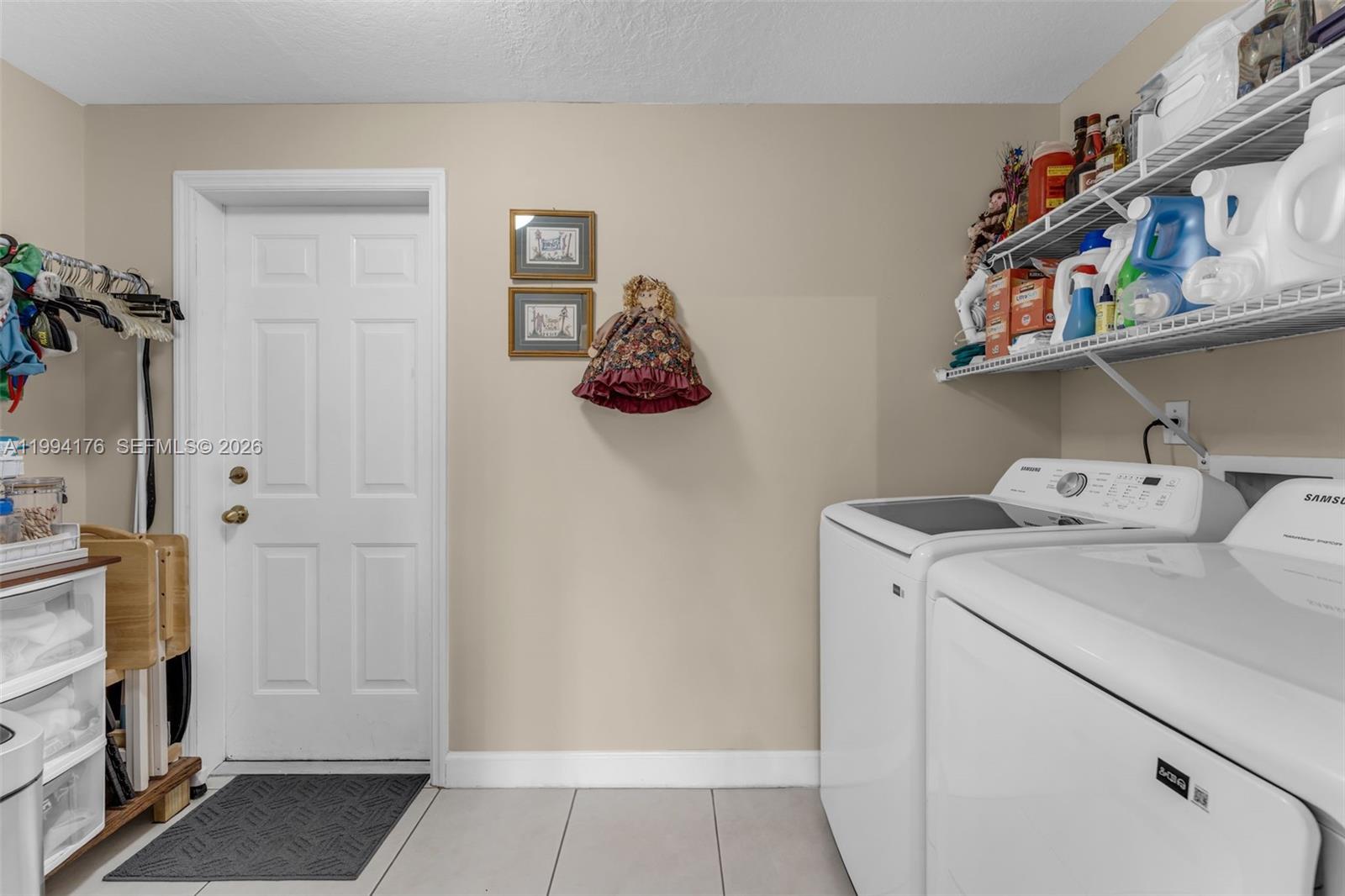 6502 Southwest 157th Court Miami, FL 33193 - Photo 11 of 51 a utility room with dryer and washer