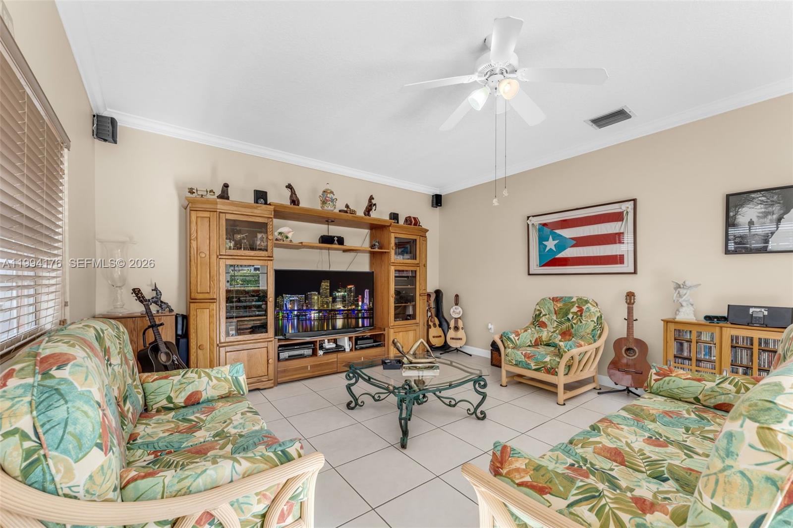 6502 Southwest 157th Court Miami, FL 33193 - Photo 12 of 51 a living room with furniture and wooden floor