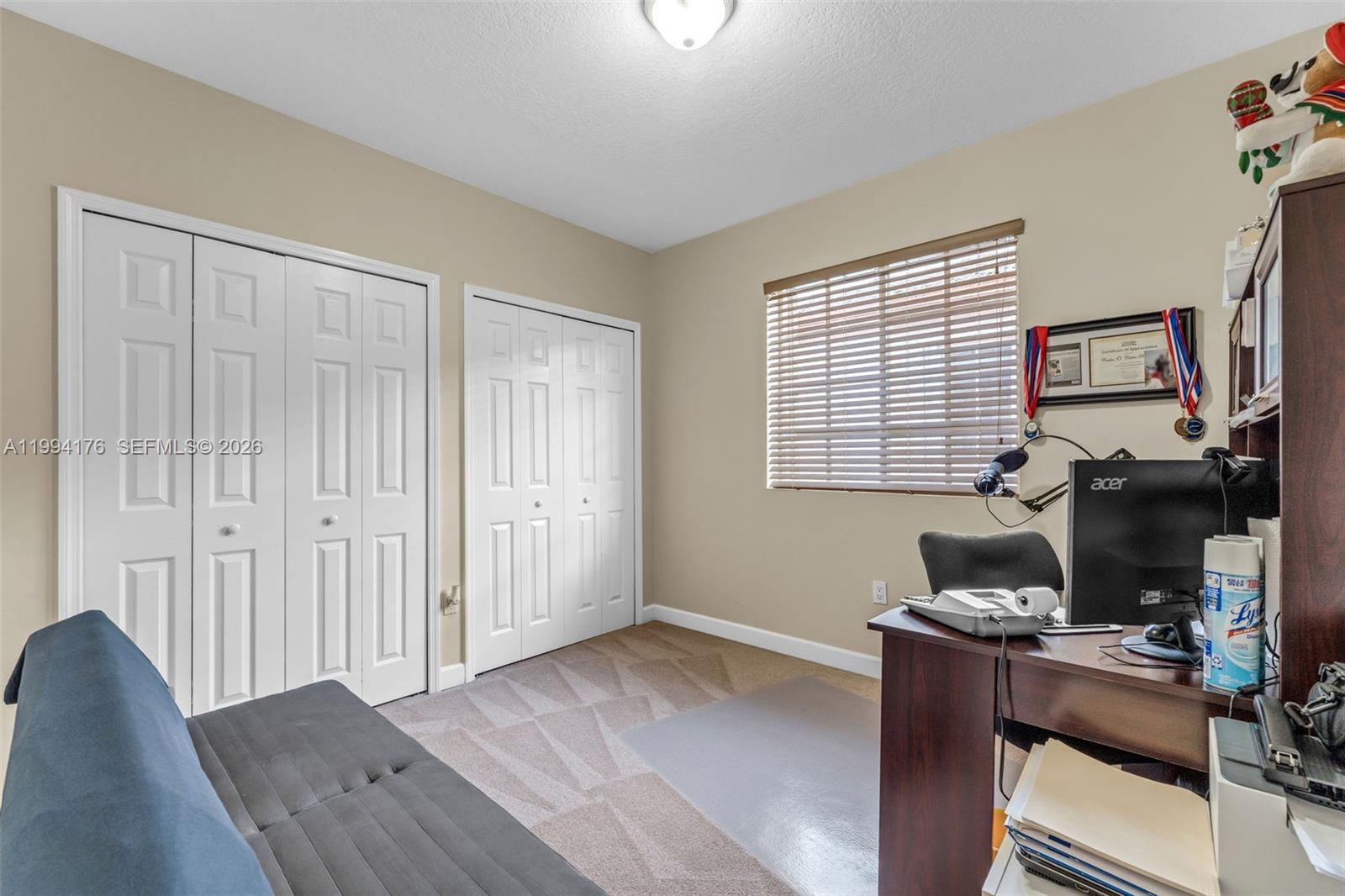 6502 Southwest 157th Court Miami, FL 33193 - Photo 28 of 51 a workspace with furniture and a window