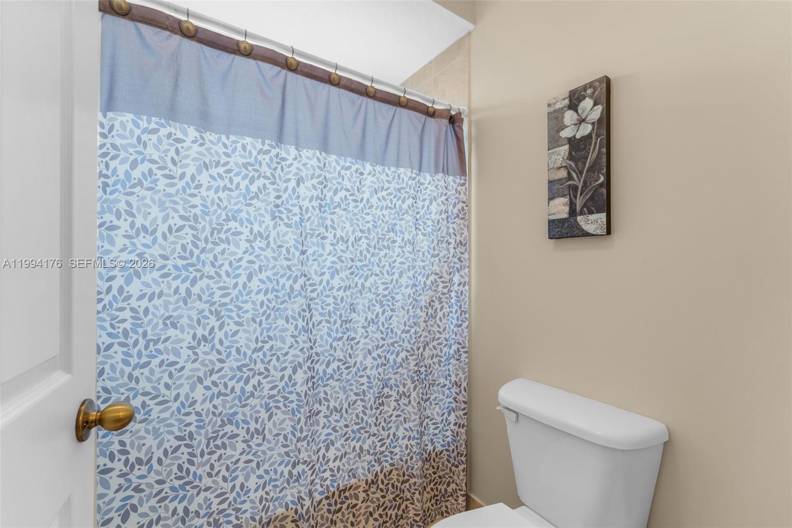 6502 Southwest 157th Court Miami, FL 33193 - Photo 32 of 51 a bathroom with a toilet and a shower