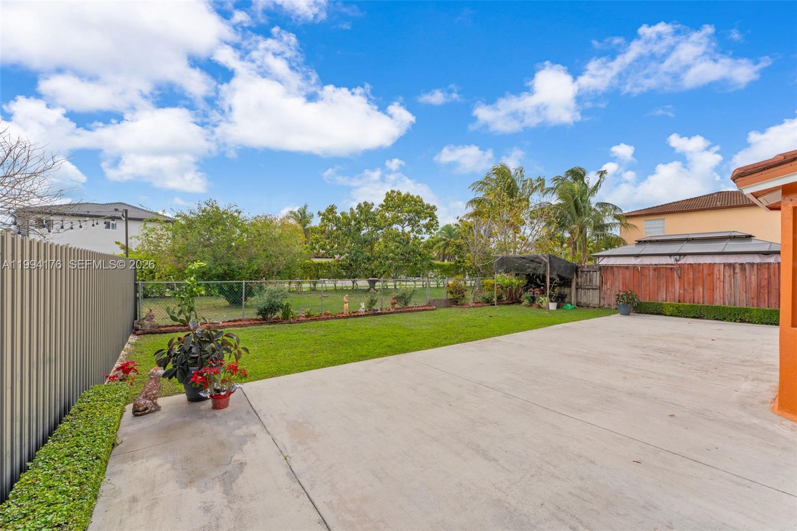 6502 Southwest 157th Court Miami, FL 33193 - Photo 35 of 51 a view of a park with large trees