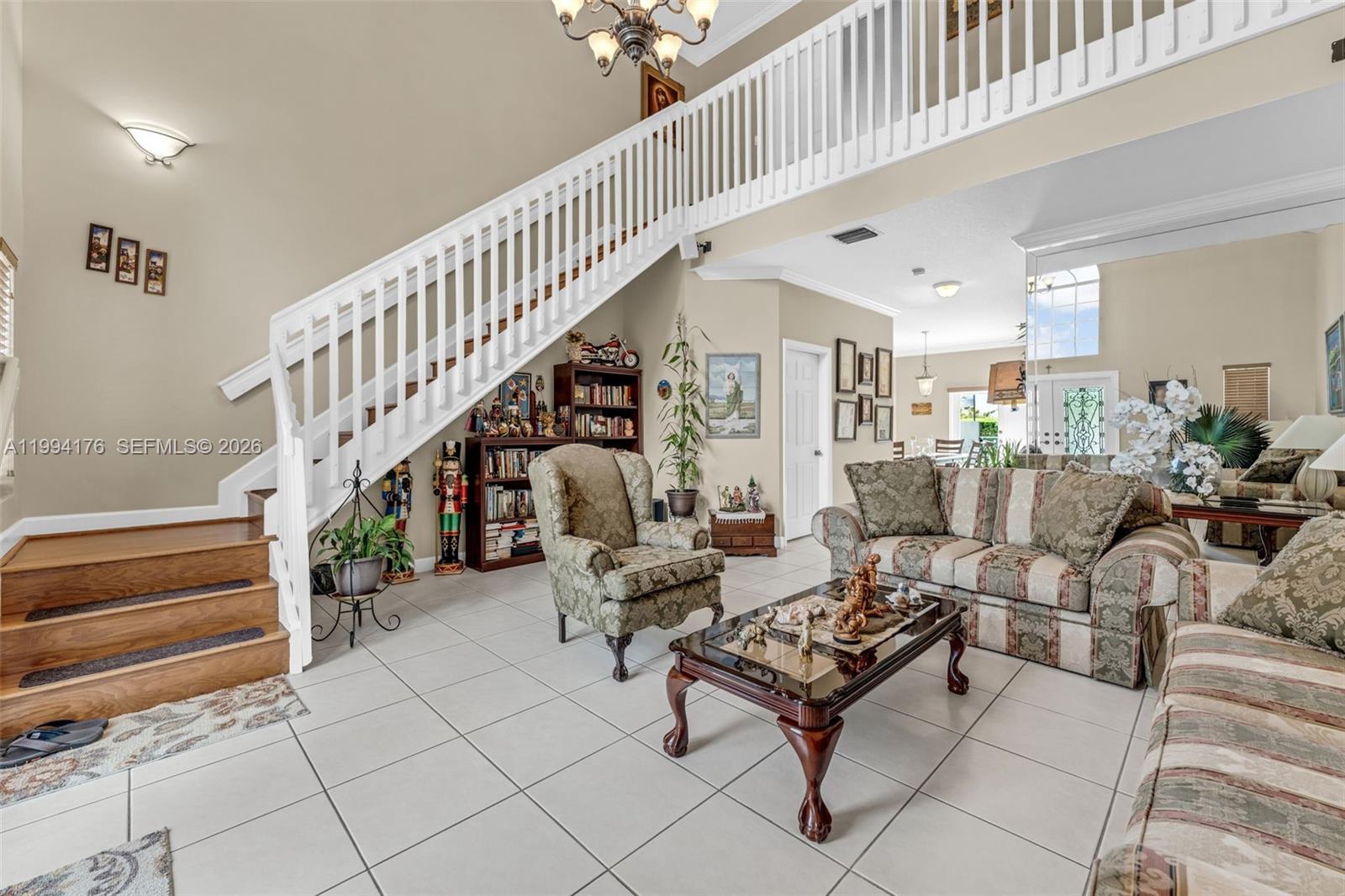 6502 Southwest 157th Court Miami, FL 33193 - Photo 4 of 51 a living room with furniture