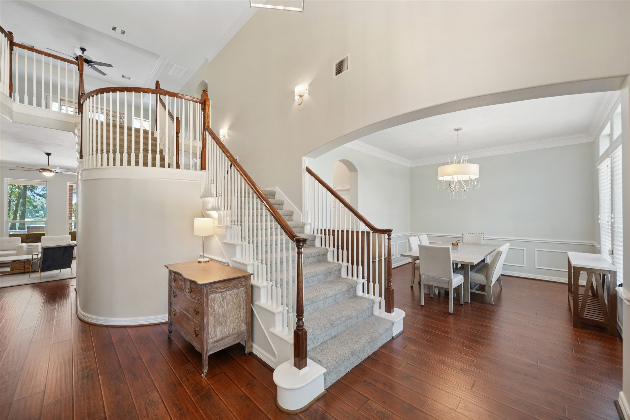 2302 Legends Shore Drive Spring, TX 77386 - Photo 7 of 48 Curved staircase and open design add elegance and character to the entry.