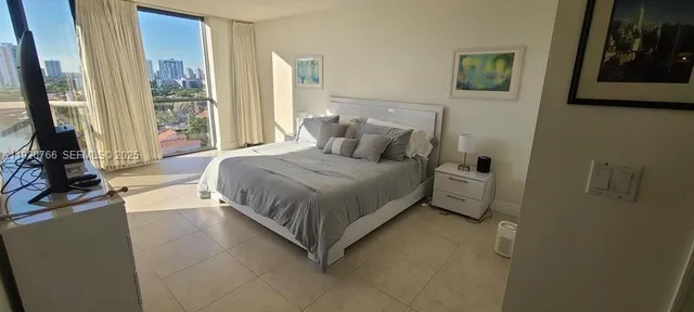 a view of a balcony with chairs