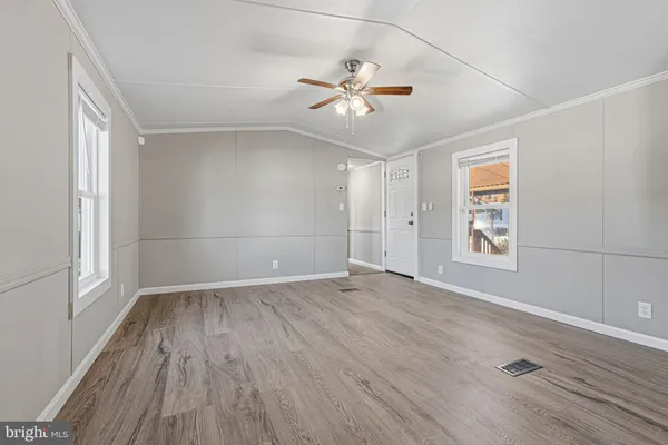 a view of an empty room with a window