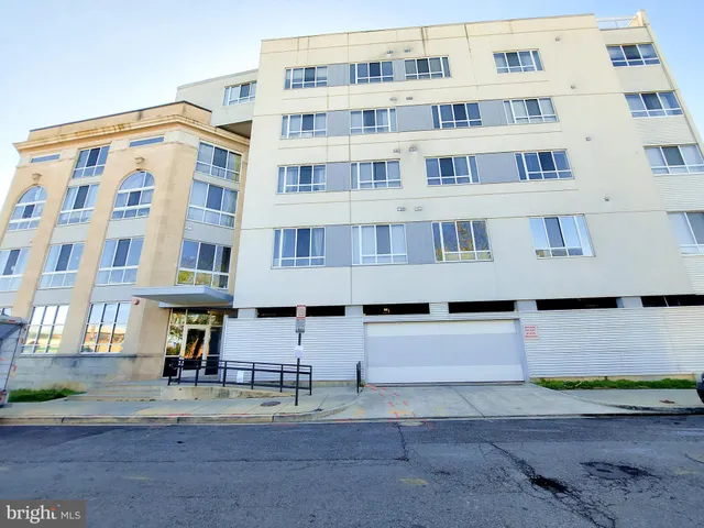 a view of a building with a street