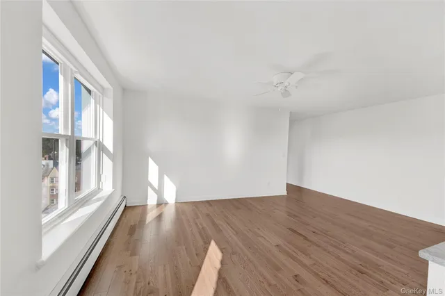a kitchen with stainless steel appliances granite countertop a sink stove and microwave