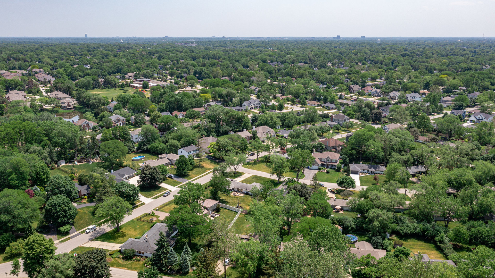 1917 Driving Park Road Wheaton, IL 60187 - Photo 38 of 41 an aerial view of a city with lots of residential buildings