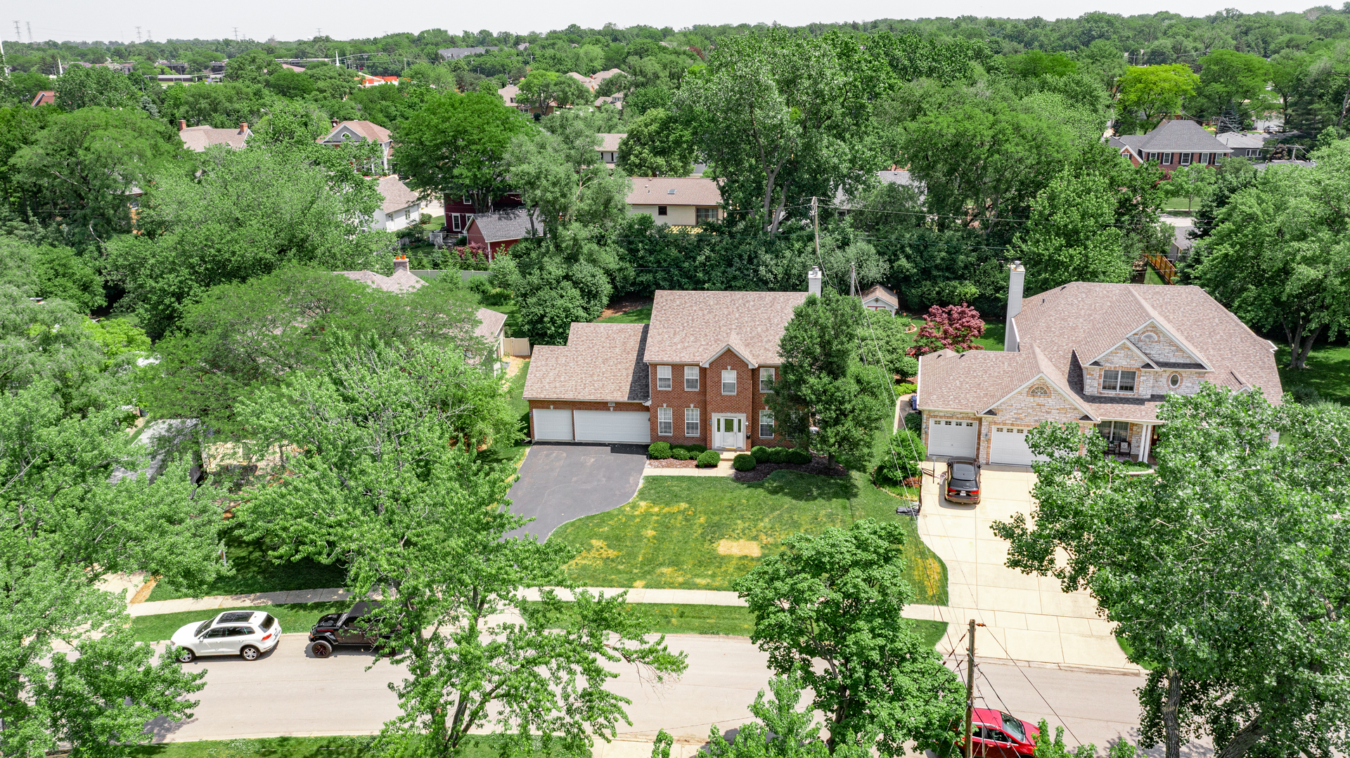1917 Driving Park Road Wheaton, IL 60187 - Photo 5 of 41 an aerial view of residential houses with outdoor space and trees all around