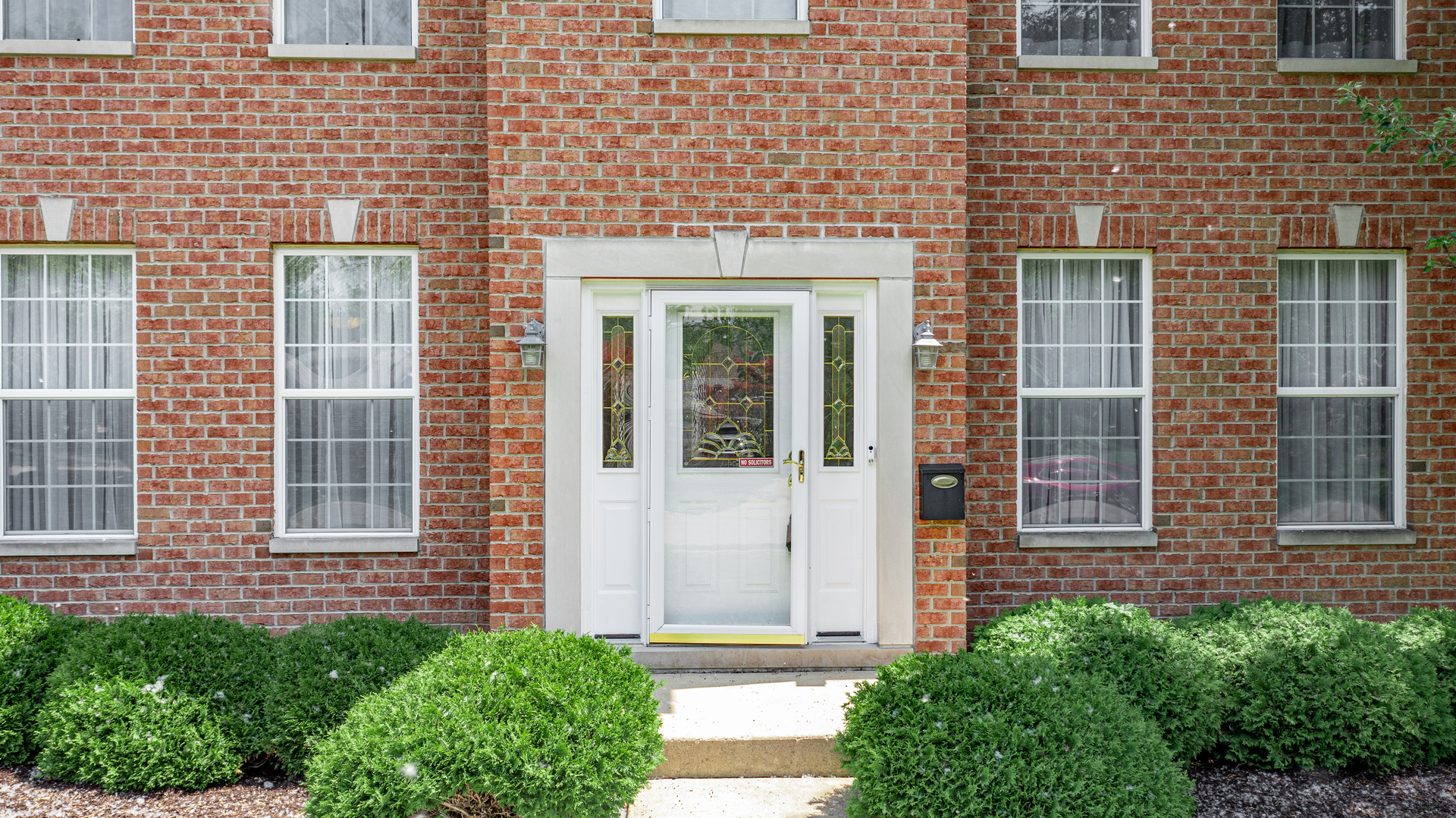 1917 Driving Park Road Wheaton, IL 60187 - Photo 6 of 41 a front view of a house with a large windows