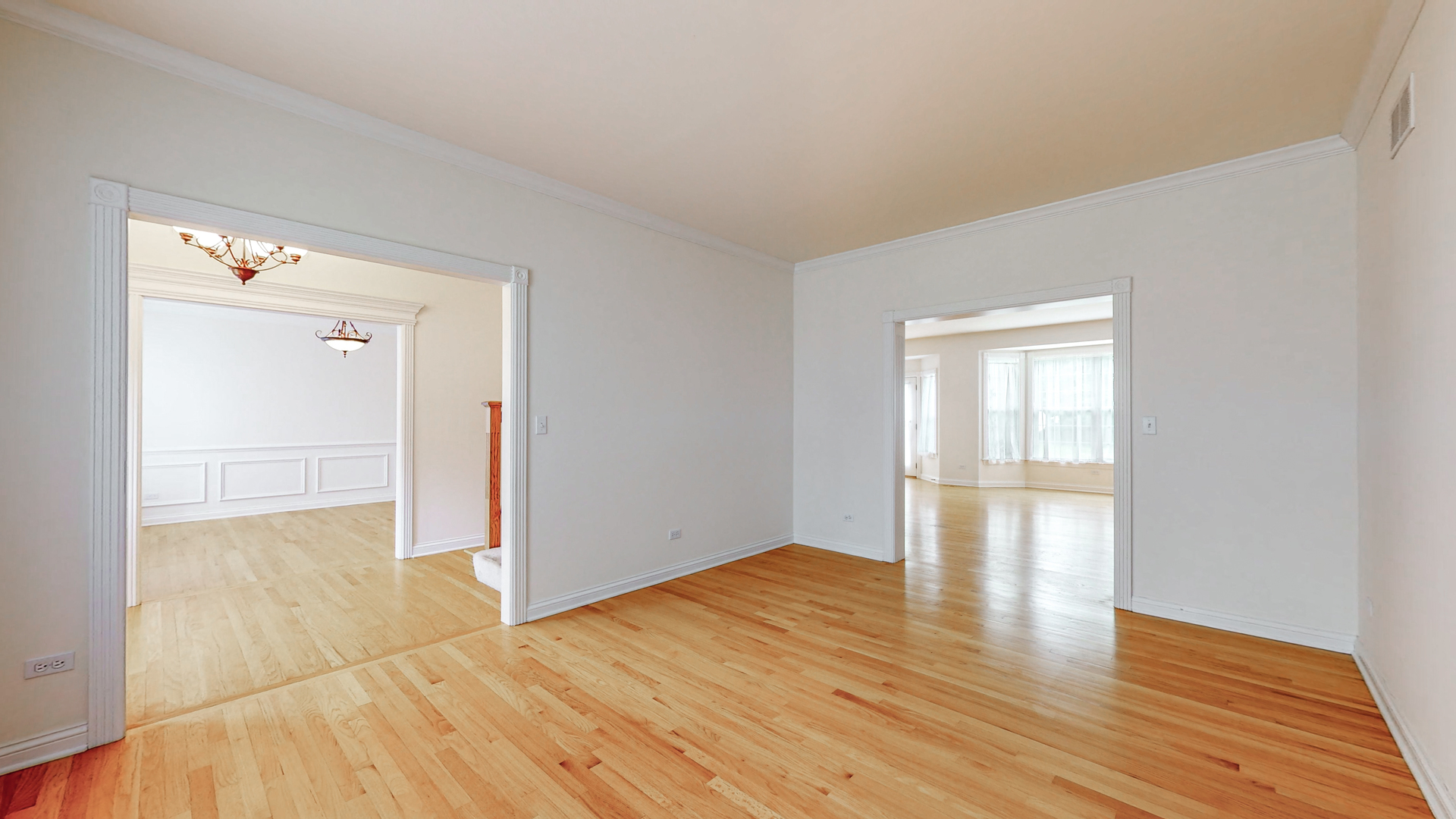 1917 Driving Park Road Wheaton, IL 60187 - Photo 10 of 41 wooden floor in an empty room