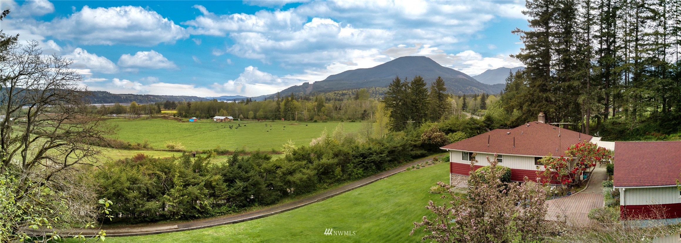 14310 Center Road Quilcene, WA 98376 - Photo 28 of 32 a view of a garden with a house