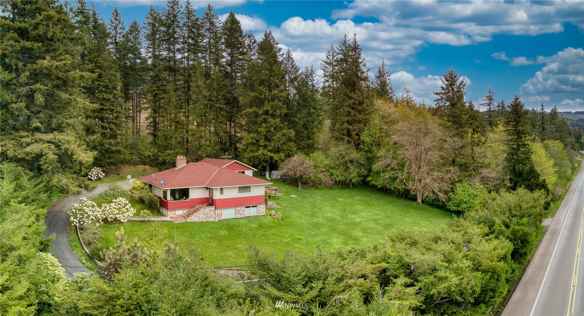 14310 Center Road Quilcene, WA 98376 - Photo 5 of 32 a view of a backyard with entertaining space
