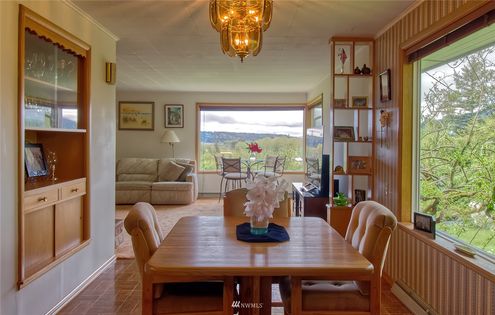 14310 Center Road Quilcene, WA 98376 - Photo 6 of 32 a view of a dining room with furniture window and outside view