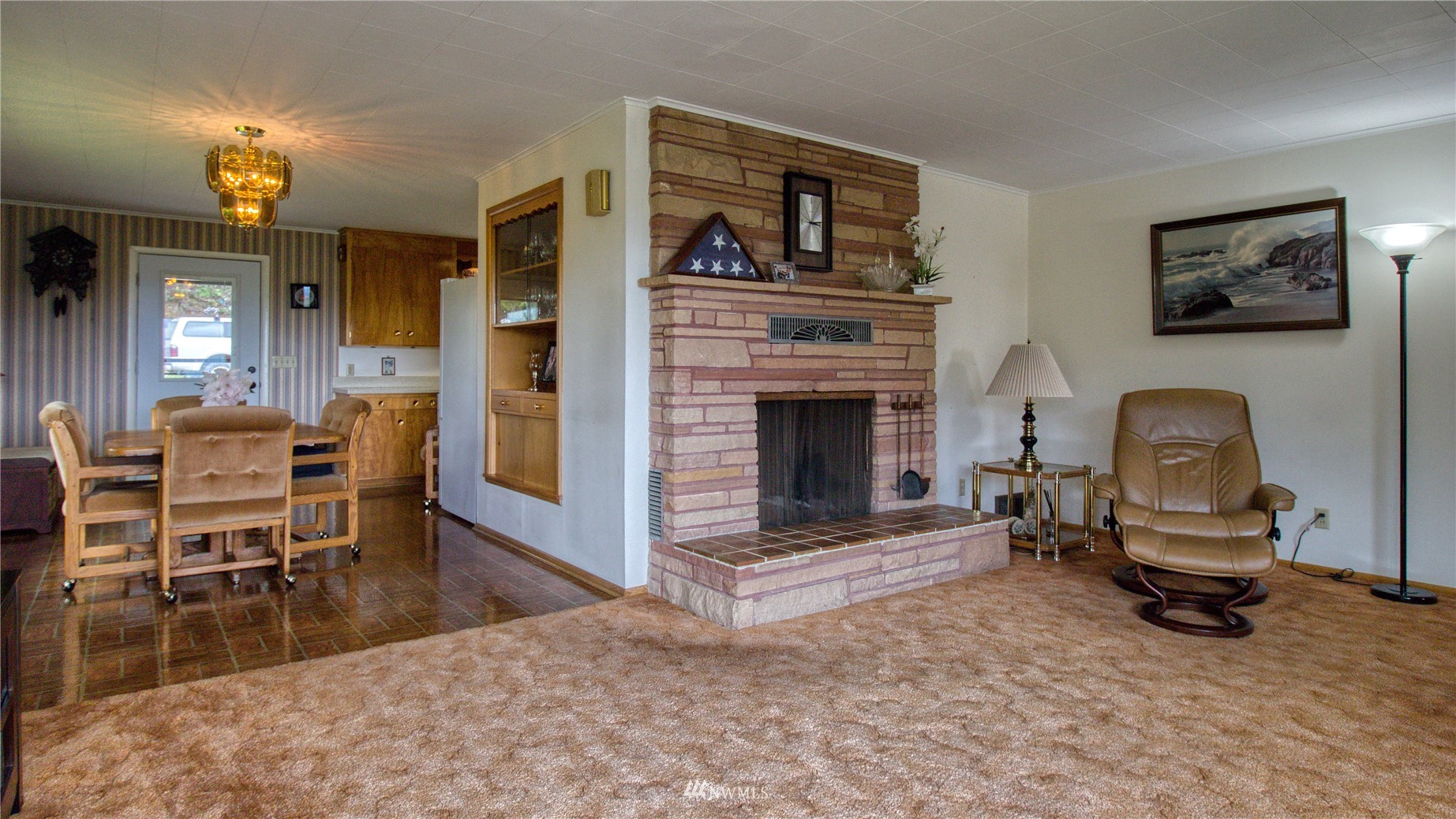 14310 Center Road Quilcene, WA 98376 - Photo 8 of 32 a living room with furniture and a fireplace