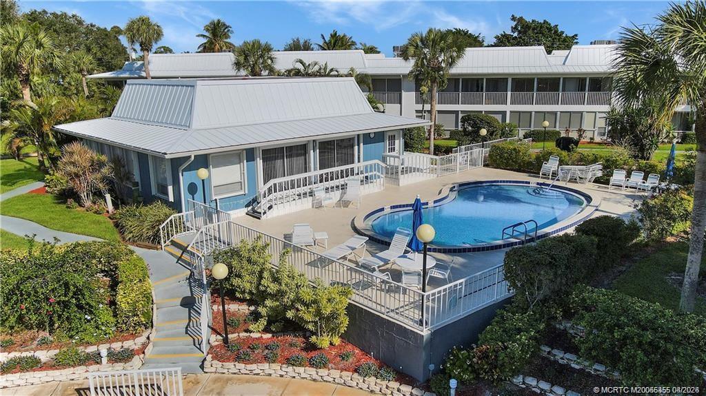 1862 Southwest Palm City Road, Unit 103 Stuart, FL 34994 - Photo 25 of 29 Main Clubhouse and pool