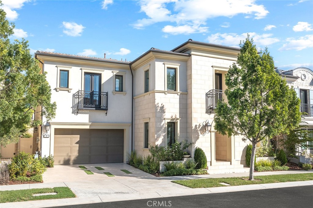85 Spacial Irvine, CA 92618 - Photo 1 of 1 a front view of a house with a yard and garage