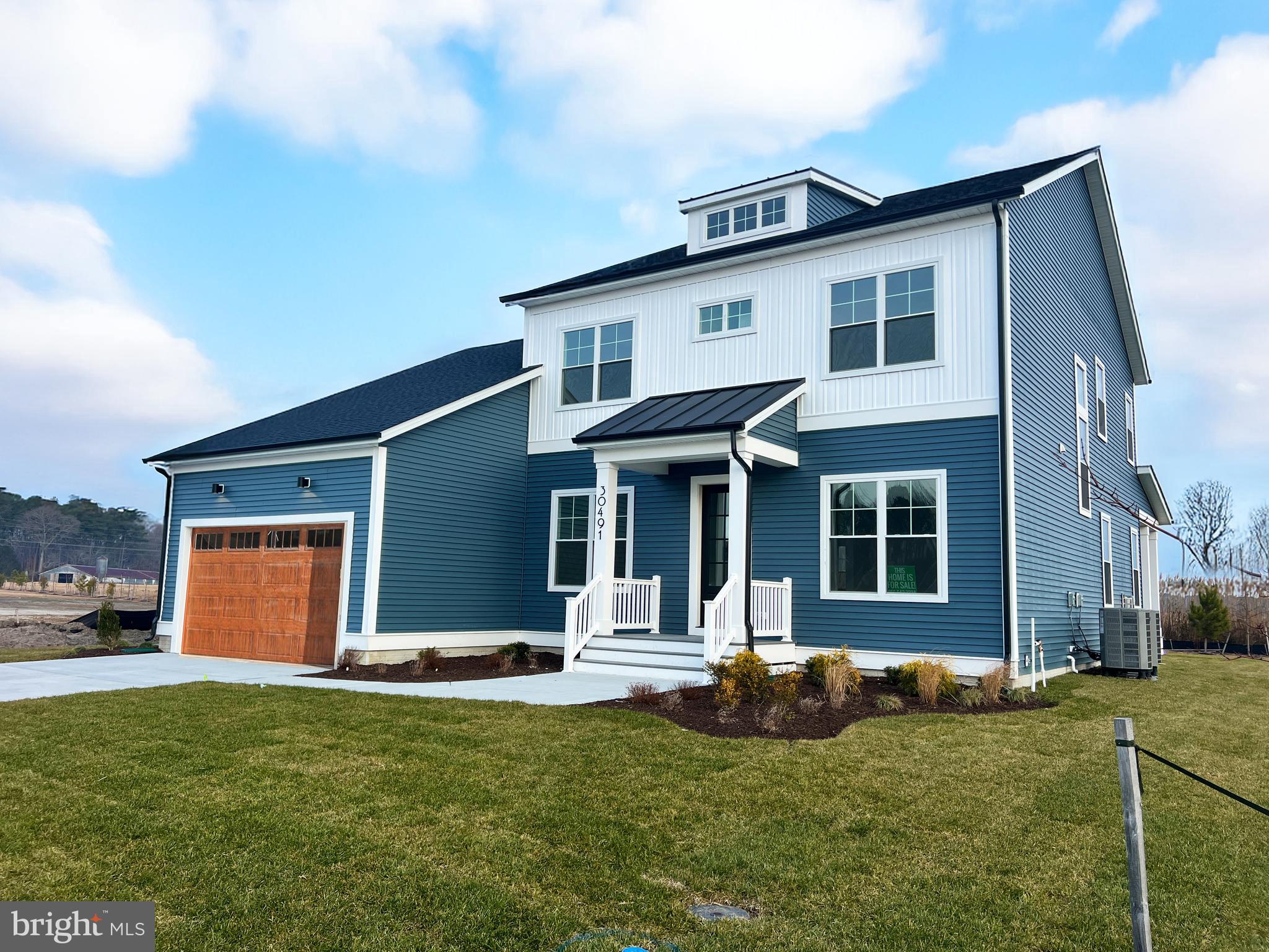 30491 Blue Beech Lane Frankford, DE 19945 - Photo 3 of 13 a front view of house with yard