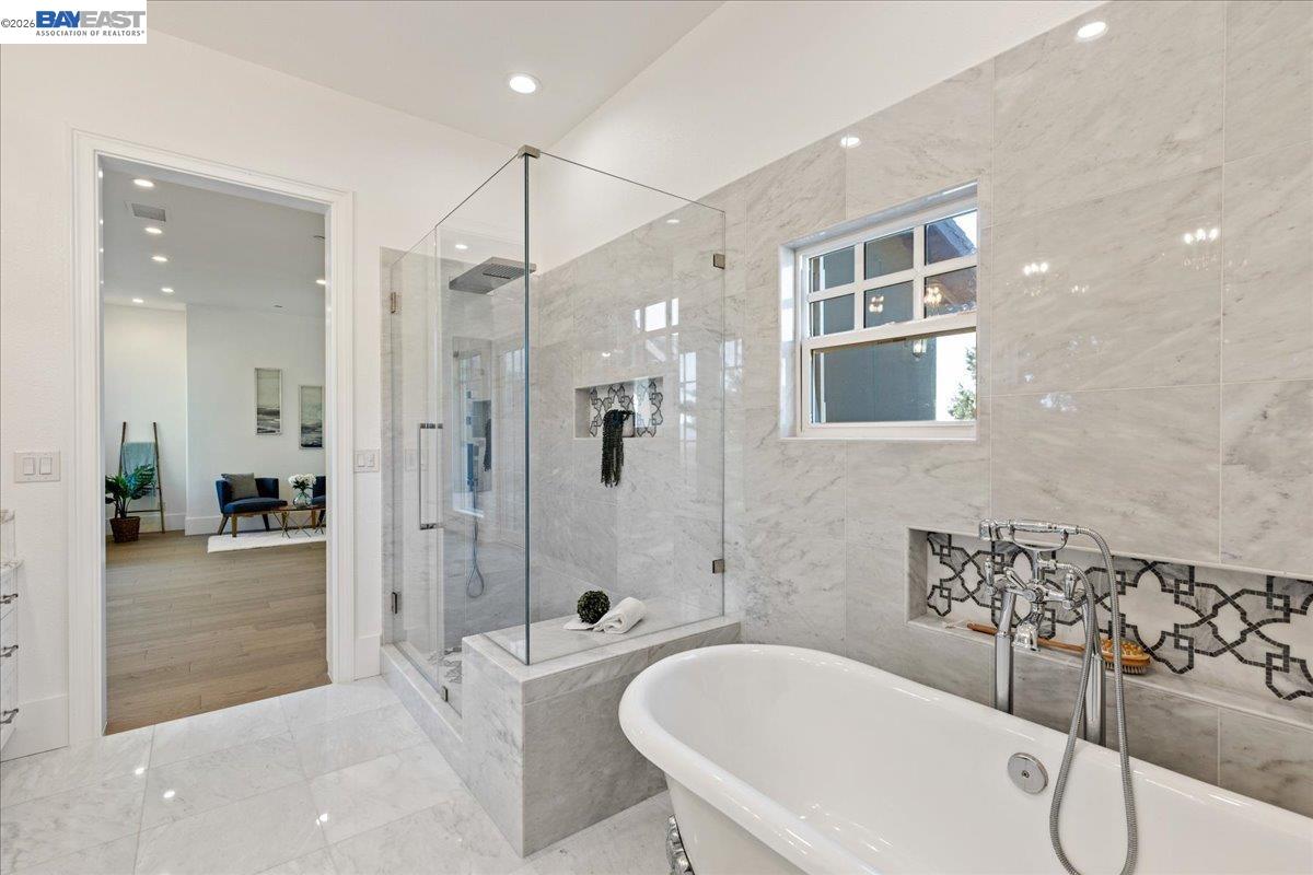 12400 Morgan Territory Road Livermore, CA 94551 - Photo 32 of 59 a bathroom with a tub a sink and a shower