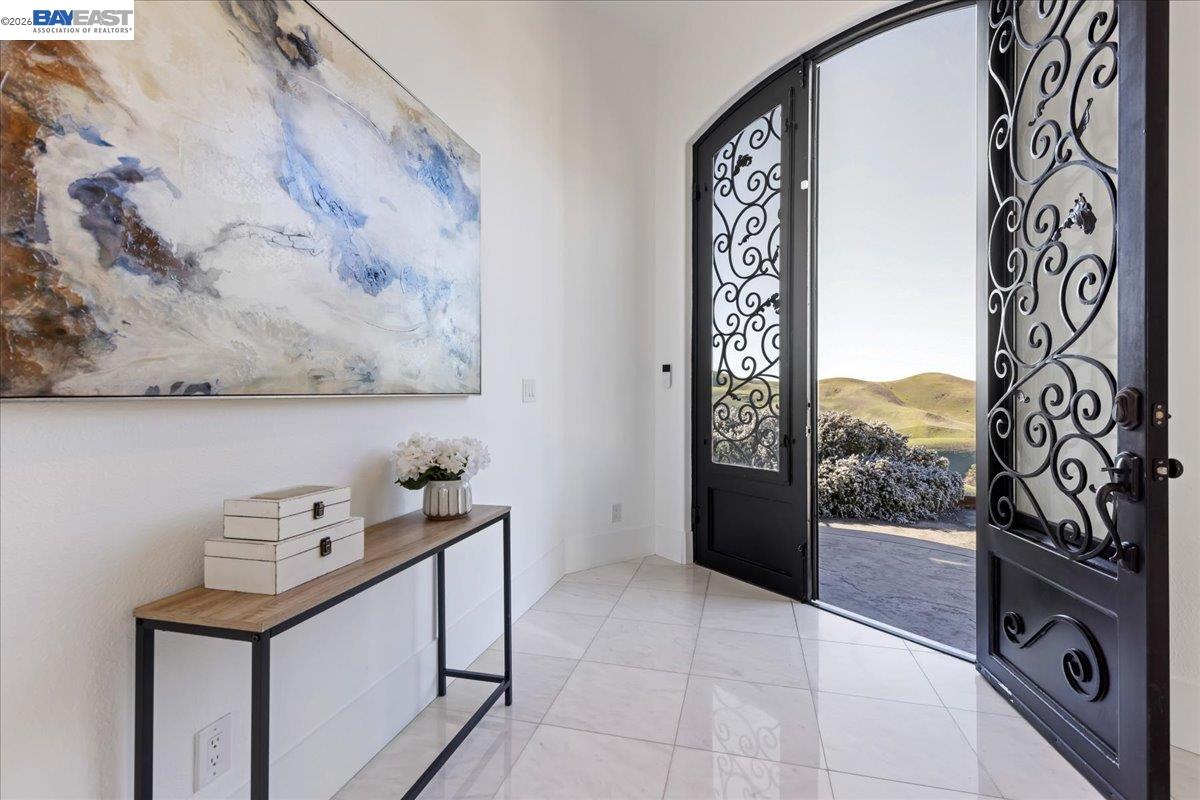 12400 Morgan Territory Road Livermore, CA 94551 - Photo 5 of 59 a view of a entryway with kitchen and furniture
