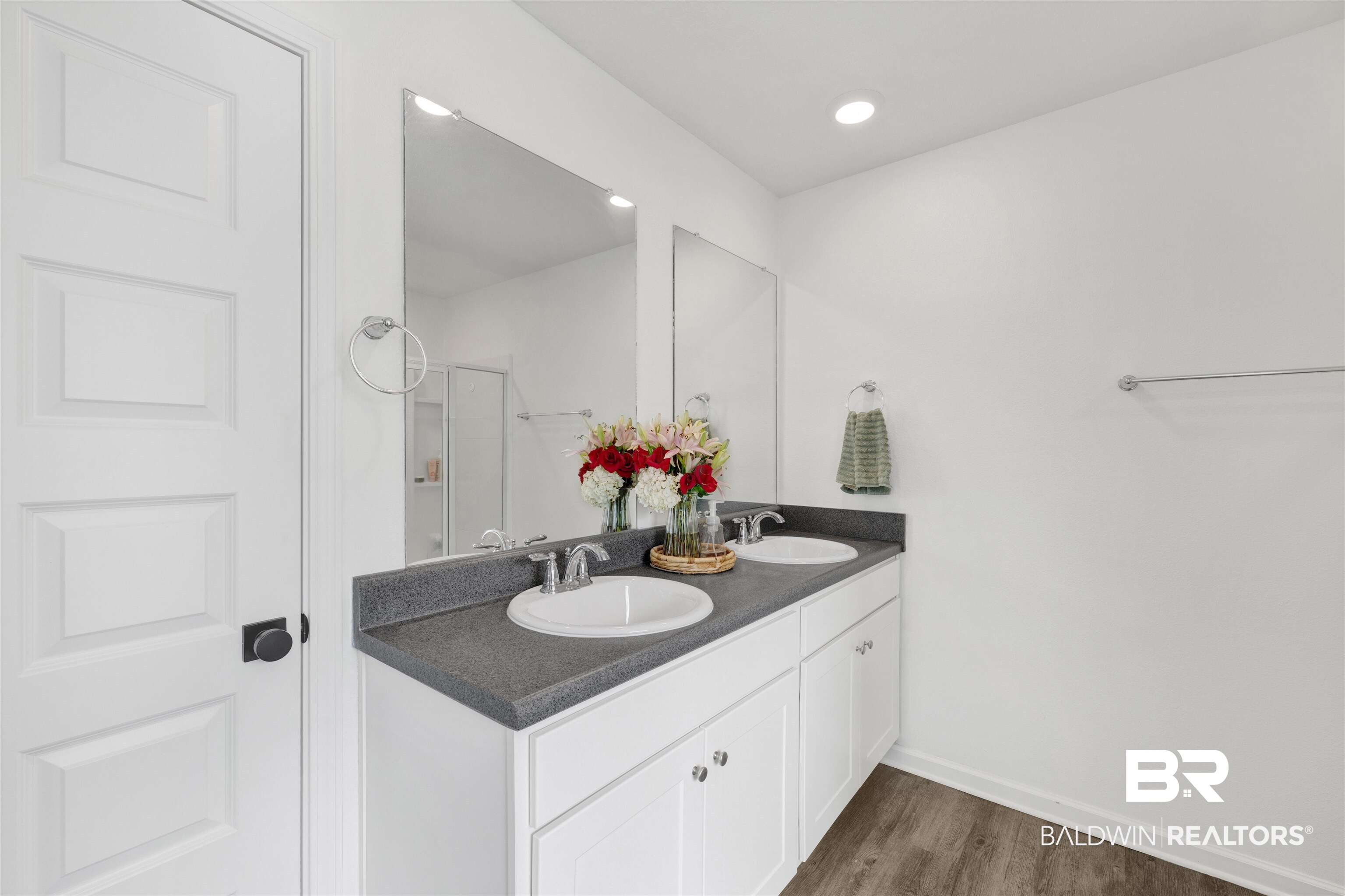 10763 Paget Drive North Mobile, AL 36608 - Photo 13 of 24 Bathroom featuring double vanity, dark wood-style flooring, a shower stall, and recessed lighting