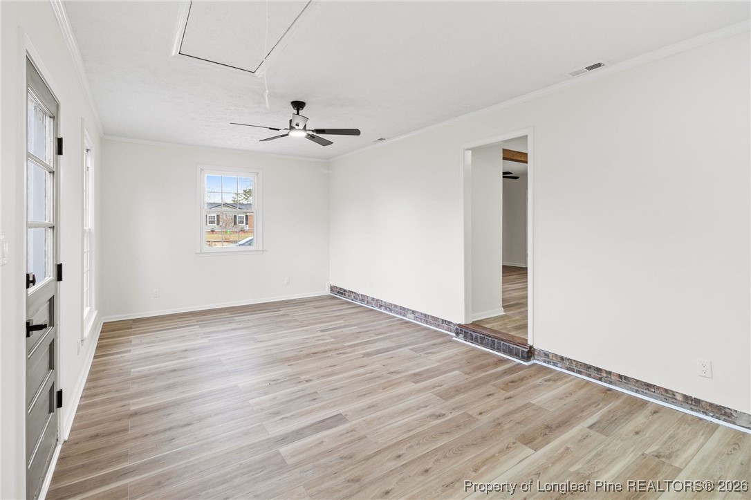 5982 Spinner Road Hope Mills, NC 28348 - Photo 14 of 32 a view of an empty room with a window