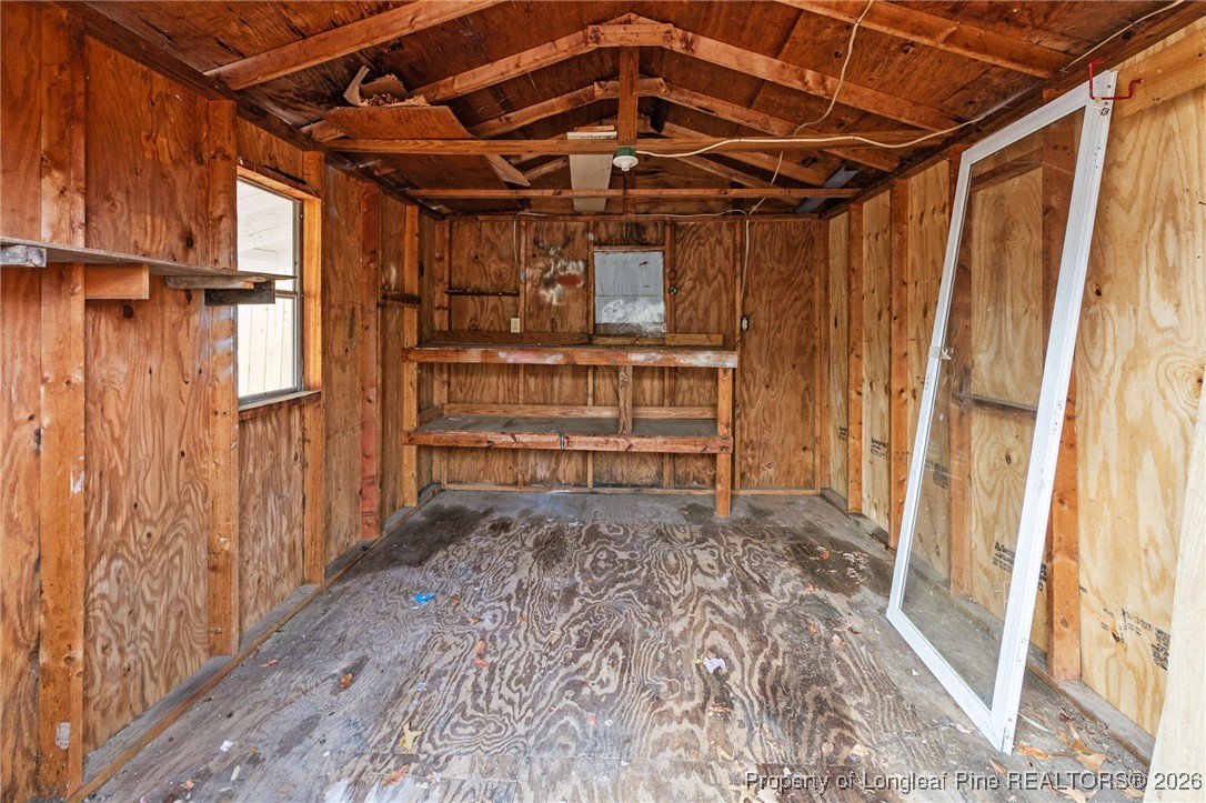 5982 Spinner Road Hope Mills, NC 28348 - Photo 29 of 32 a view of walk in closet with empty racks