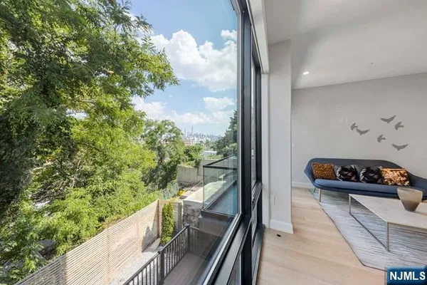 a balcony with wooden floor