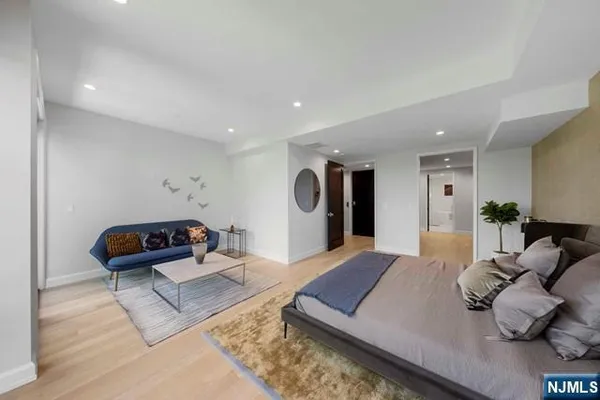 a living room with furniture and a table