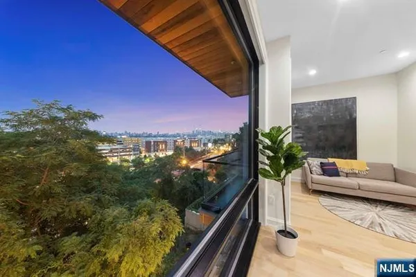 a view of balcony with furniture