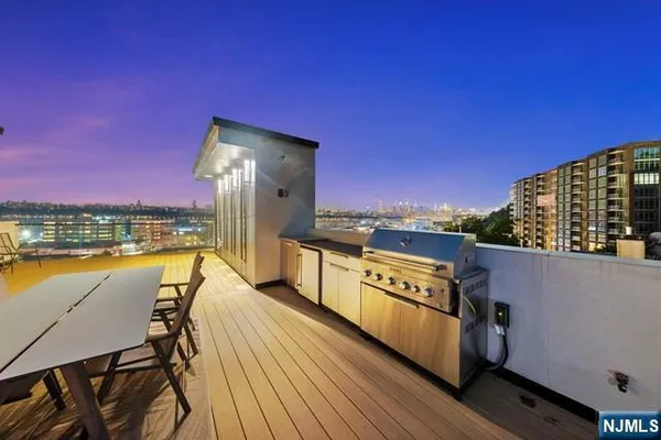 a view of a balcony with chairs