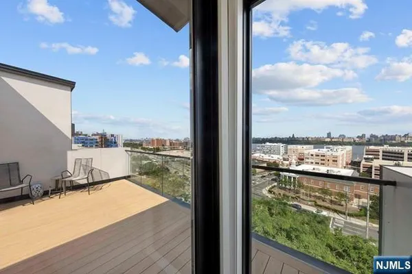 a view of a balcony with an ocean view