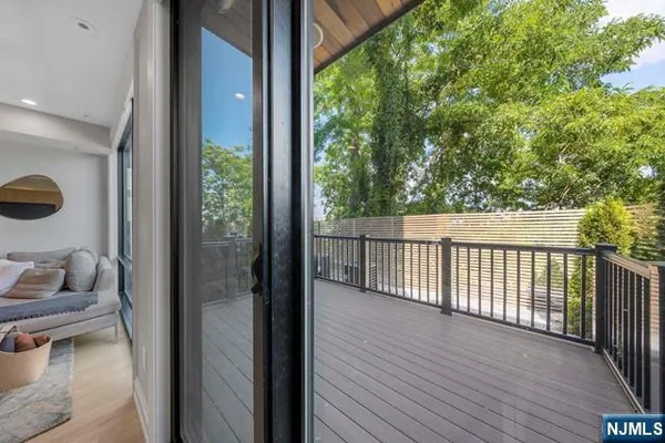a balcony with wooden floor