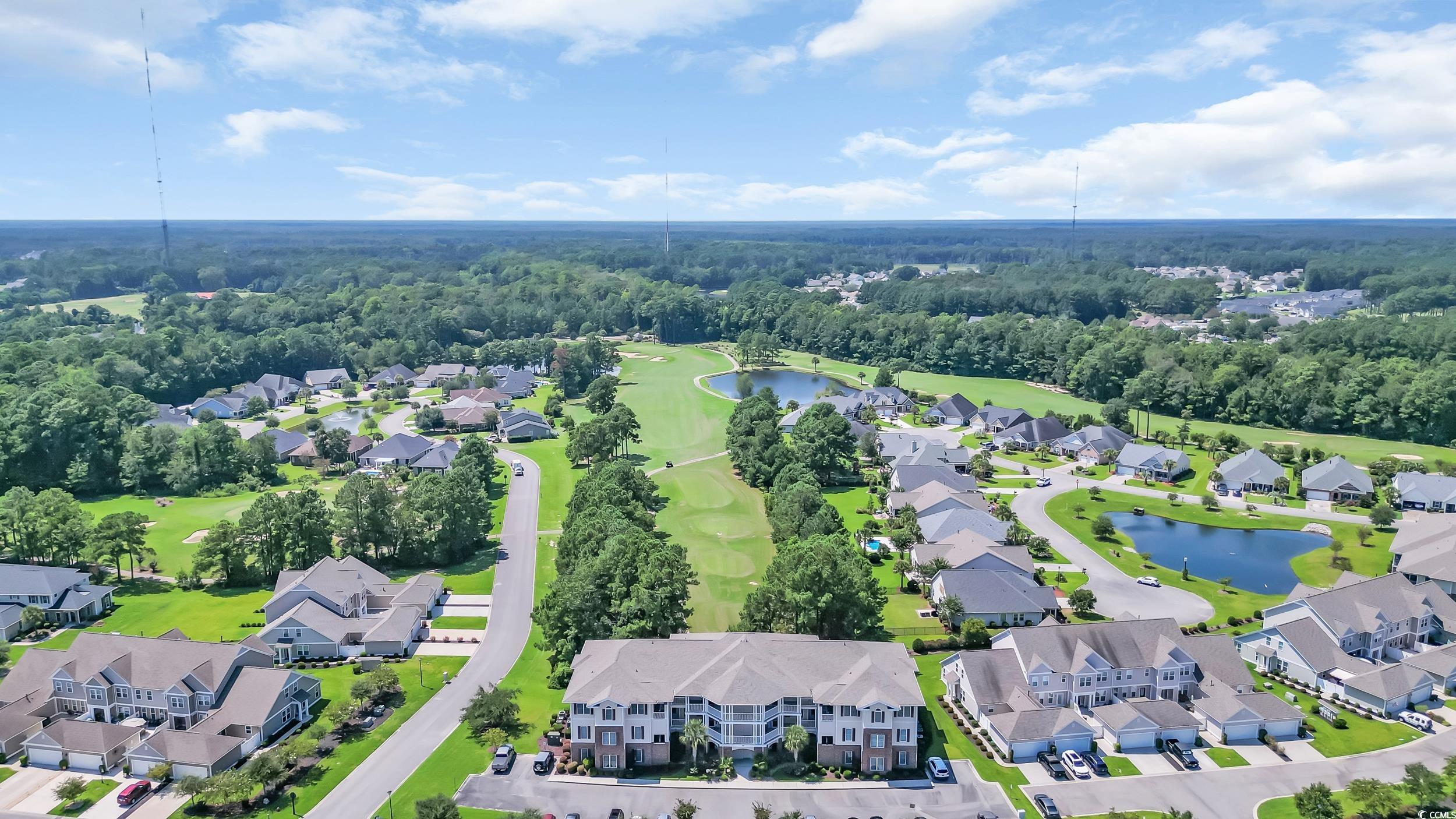 730 Pickering Drive, Unit 301 Murrells Inlet, SC 29576 - Photo 25 of 30 Aerial view of property's location featuring nearby suburban area and a nearby body of water