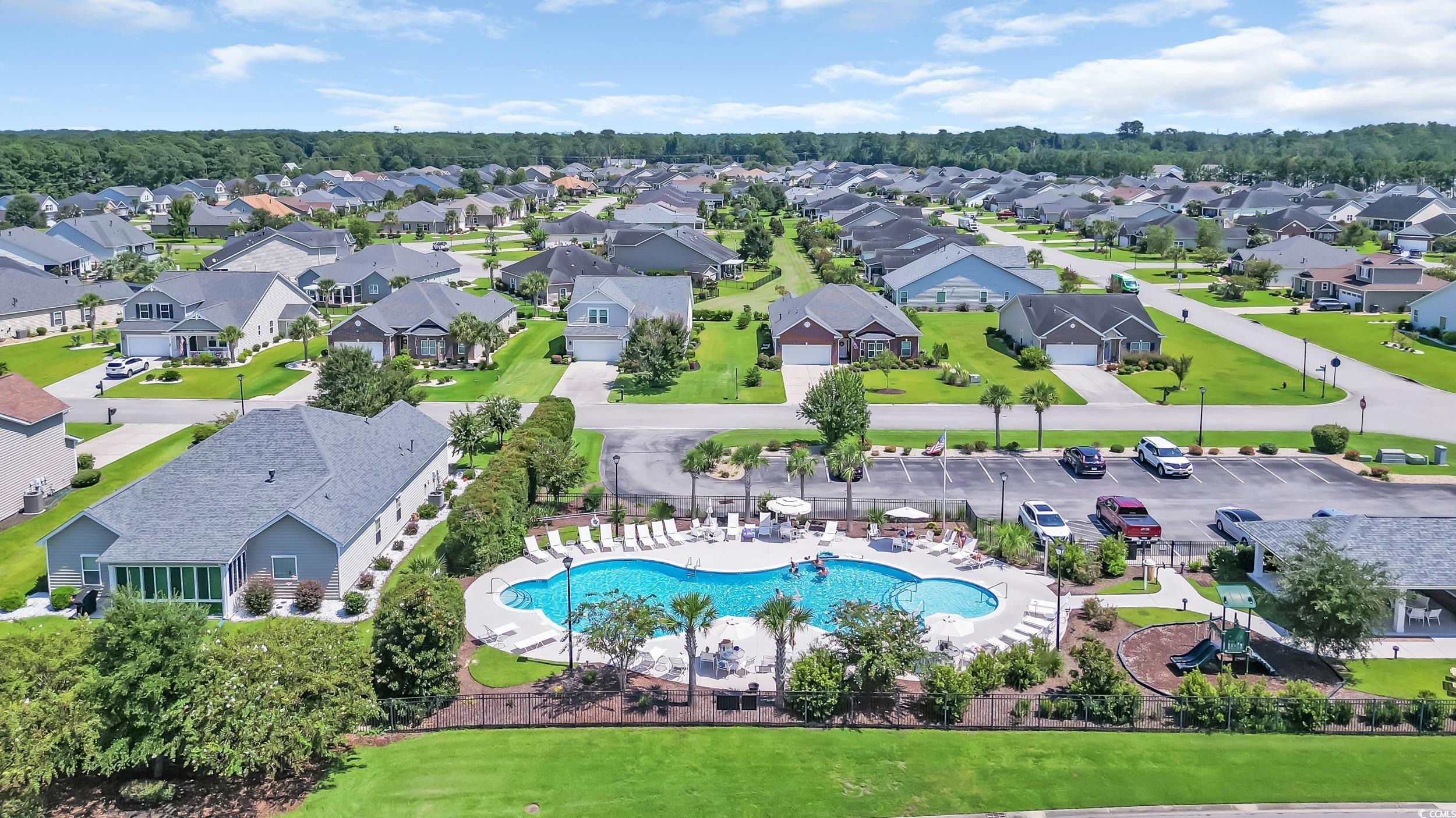730 Pickering Drive, Unit 301 Murrells Inlet, SC 29576 - Photo 27 of 30 Aerial view of residential area with a pool