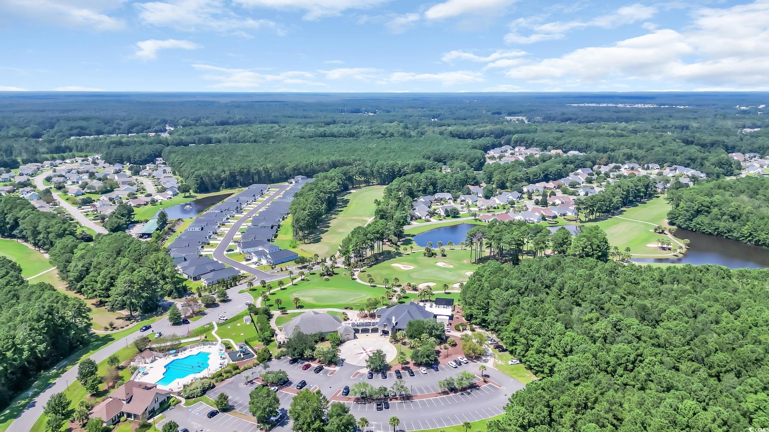 730 Pickering Drive, Unit 301 Murrells Inlet, SC 29576 - Photo 28 of 30 Aerial view of property's location featuring a nearby body of water and a golf course