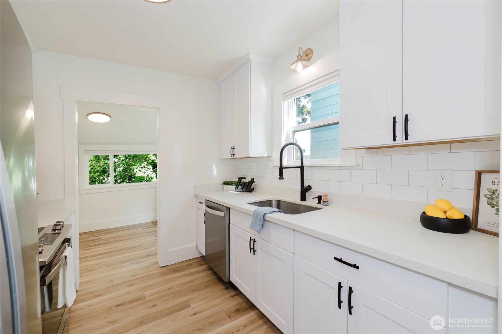 1540 7th Street Bremerton, WA 98337 - Photo 11 of 36 a kitchen with a sink and a stove top oven