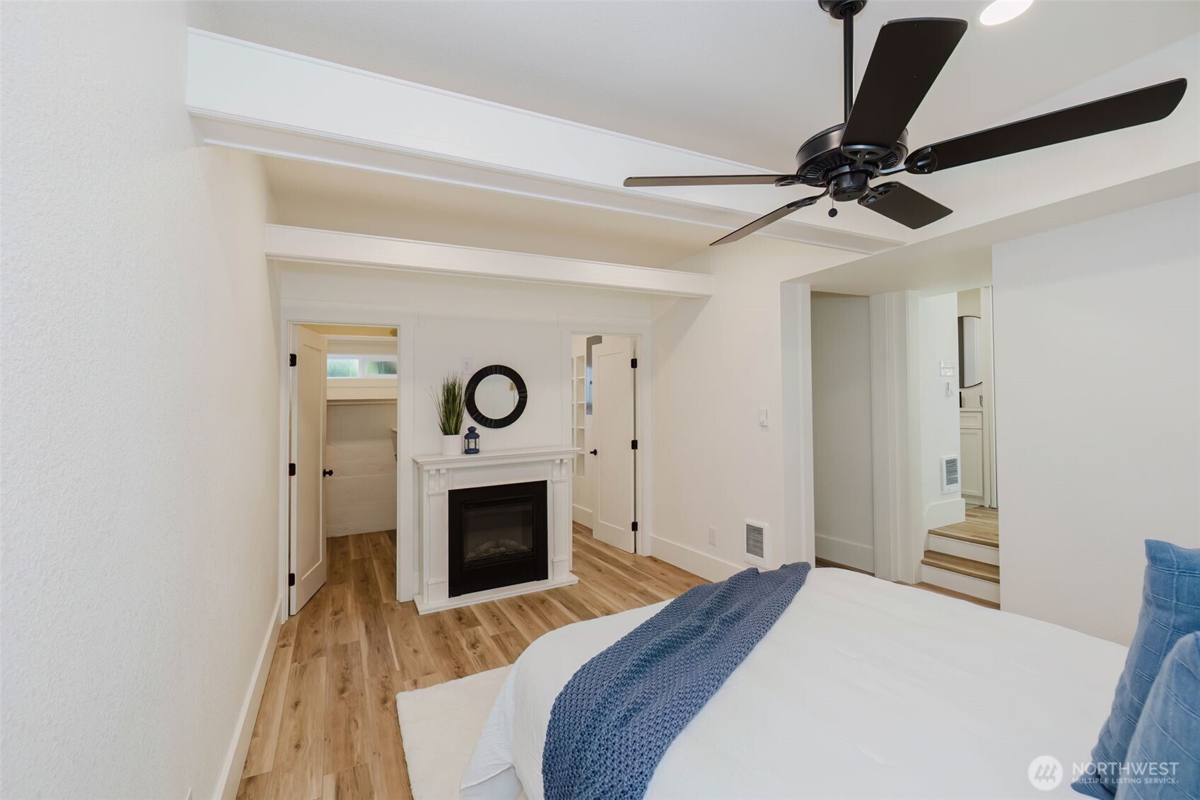 1540 7th Street Bremerton, WA 98337 - Photo 13 of 36 a bedroom with a bed and a fireplace