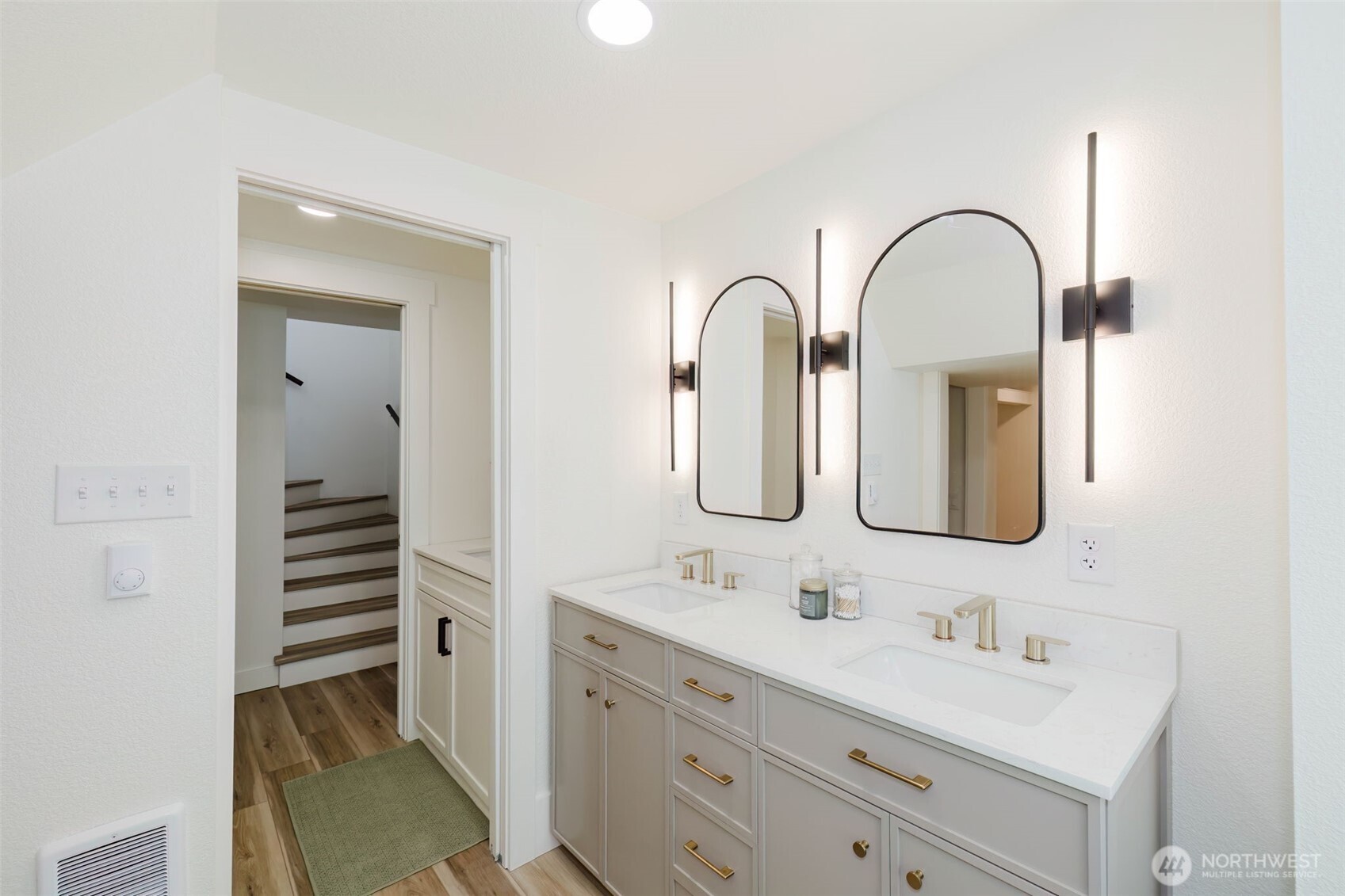 1540 7th Street Bremerton, WA 98337 - Photo 14 of 36 a bathroom with a double vanity sink and a mirror