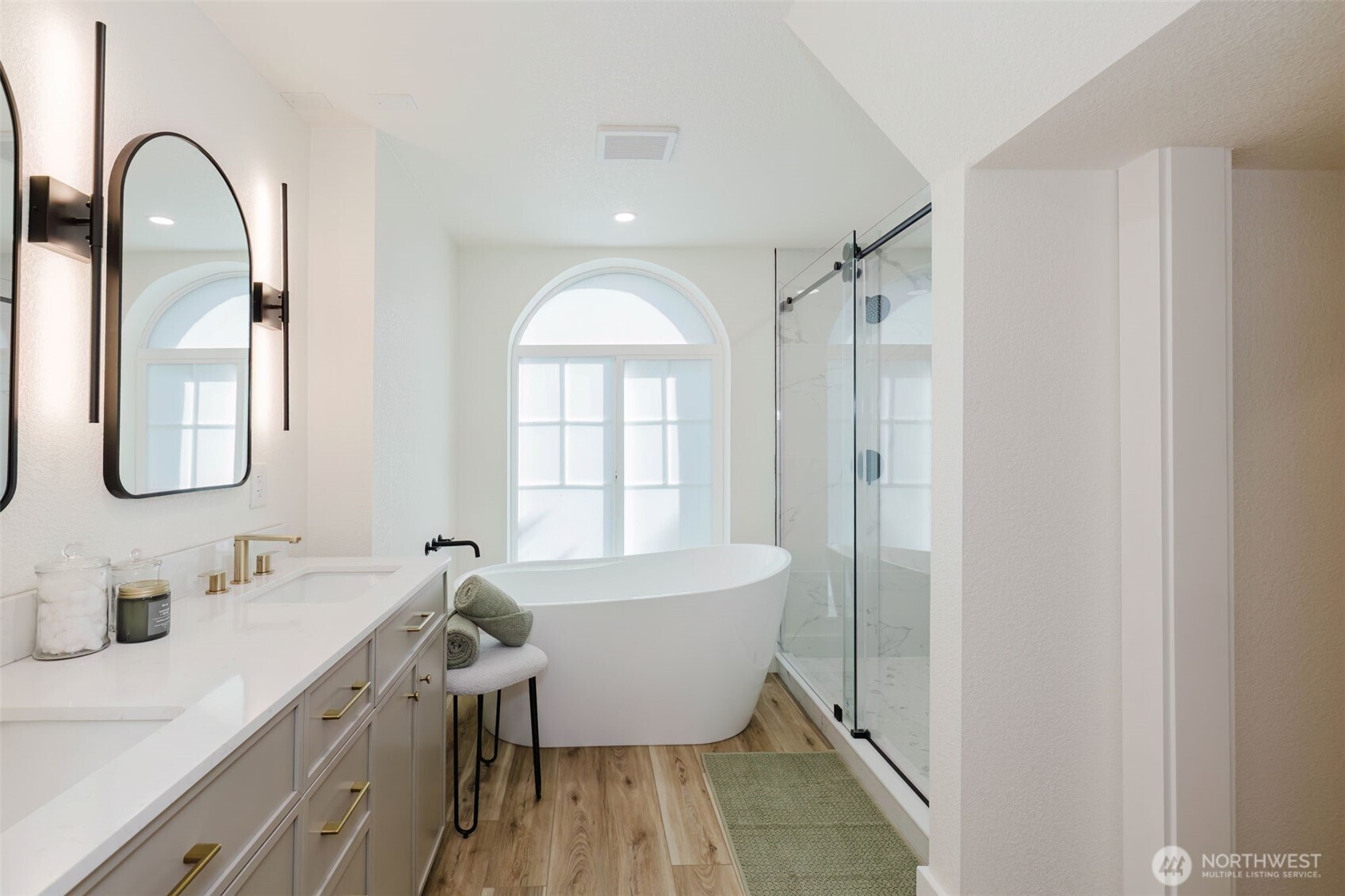 1540 7th Street Bremerton, WA 98337 - Photo 15 of 36 a bathroom with a sink and a mirror