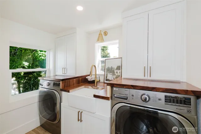 a utility room with dryer and washer