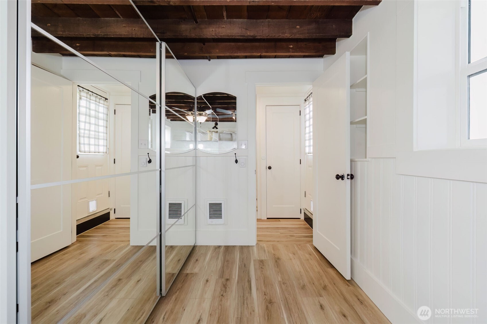 1540 7th Street Bremerton, WA 98337 - Photo 30 of 36 a view of a bathroom with wooden floor and a glass door